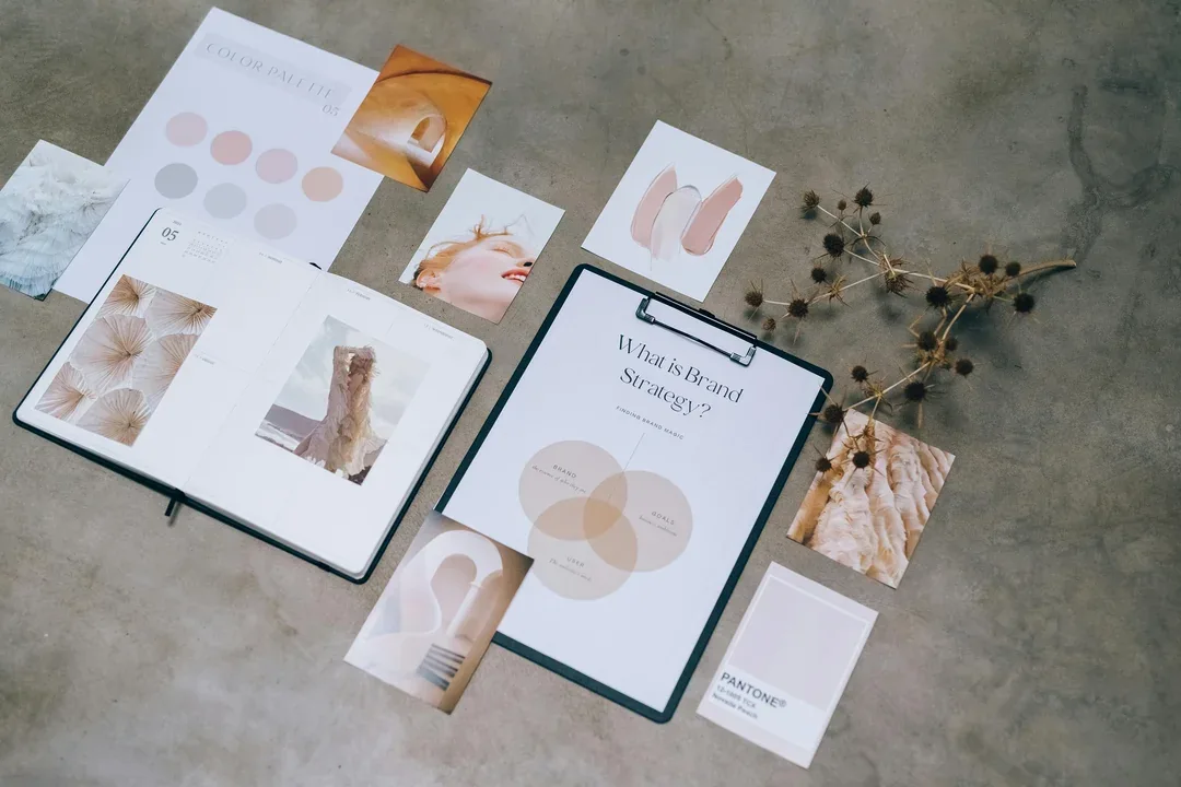 Design materials and a tablet arranged on a desk