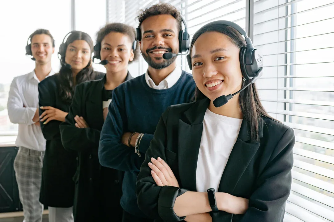 Customer support team wearing headsets